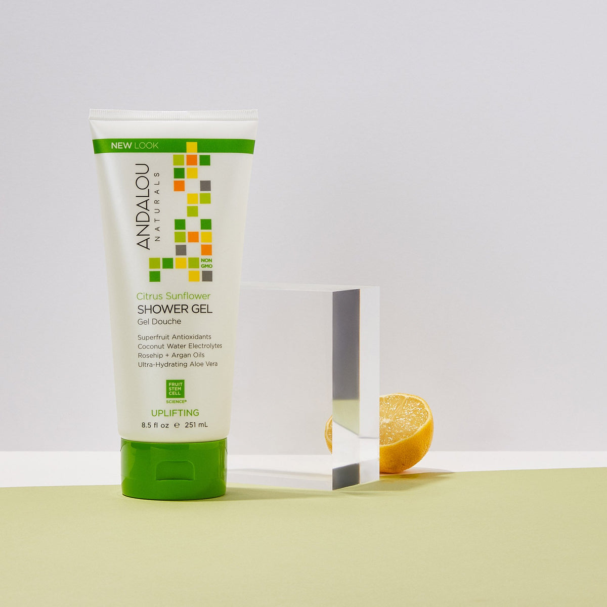 Trial Size Citrus Sunflower Uplifting Shower Gel with half an orange